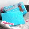 Close View of Dog Scrubby Soapy Sponge Packet and 1 Sponge outside the packet